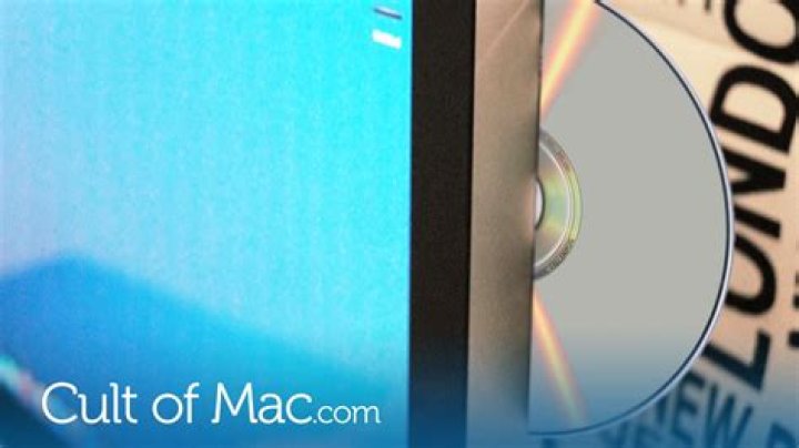 How do I force eject a CD from my Macbook?