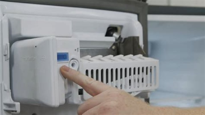 How do I reset my Hotpoint ice maker?