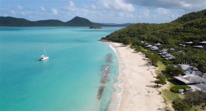 How far is Hermitage Bay from airport?