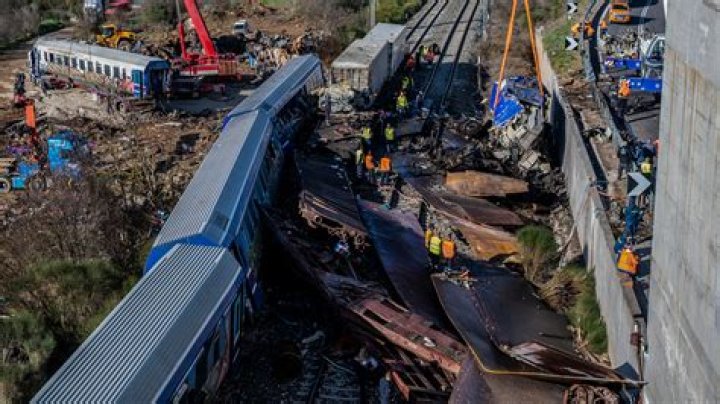 How was a train in Rotterdam stopped from crashing?